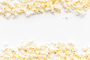 Popcorn background on white top view copy space