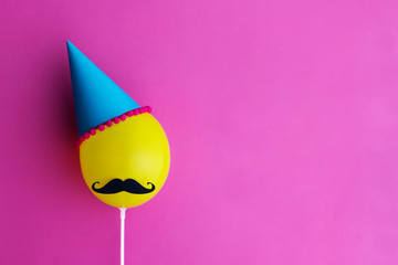 Balloon with party hat and moustache - obrazy, fototapety, plakaty