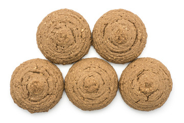Five oat cookies top view isolated on white background brown round crispy.