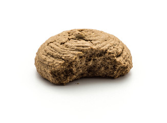 One bitten cocoa oat cookie isolated on white background drop shape brown crispy biscuit.