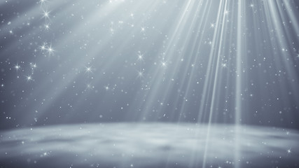 Silver particles and stars flying in light rays abstract background