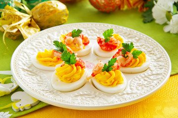Eggs stuffed with creamy mousse and crayfish.