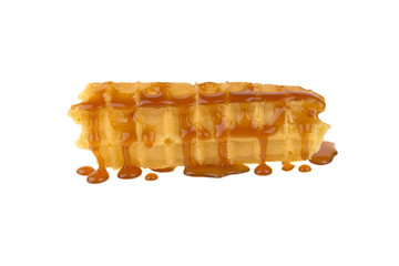 a wafer of waffle caramel isolated on white background