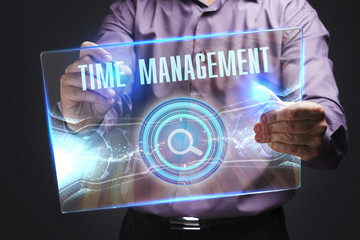The concept of business, technology, the Internet and the network. A young entrepreneur working on a virtual screen of the future and sees the inscription: Time management