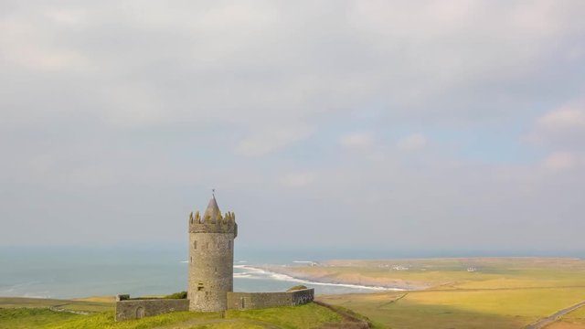 Time lapse video of Doolin Castle in County Clare, Ireland. Time-lapse is panning and motion over the Castle. Scenic Irish countryside landscape.