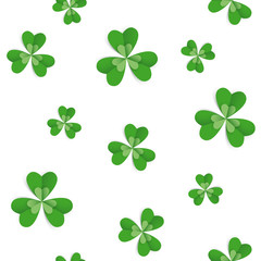 Seamless pattern with clover leaves for St Patrick's Day party. Paper cut style vector illustration. Green and white colours