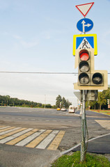 traffic lights near the road in the city in summer