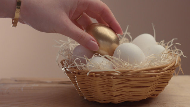 mix of different eggs and the golden one on the first plane closeup