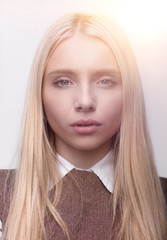 closeup face of a distressed young business women.