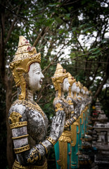 Statues on the Buddhist cemetery. North of Thailand. Chiang Mai