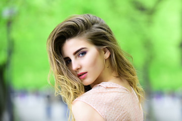 Naklejka premium Girl with makeup, long hair, beauty