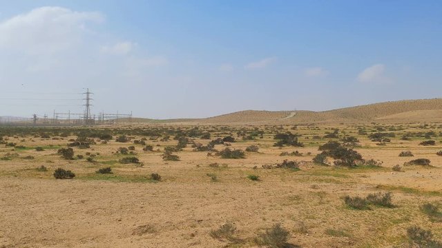 Panoramic from electric station to desert Negev at winter