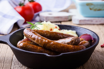 Sausage and onion casserole with potato mash