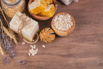 Obraz na płótnie Canvas Honeycomb, sea salt, oatmeal and handmade soap with honey