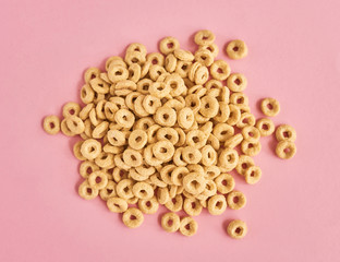 Cereals on pink background