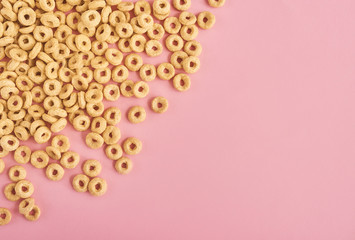 Cereals on pink background