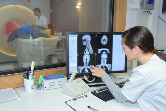 radiologist monitoring the procedure