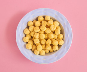 Cereals on pink background