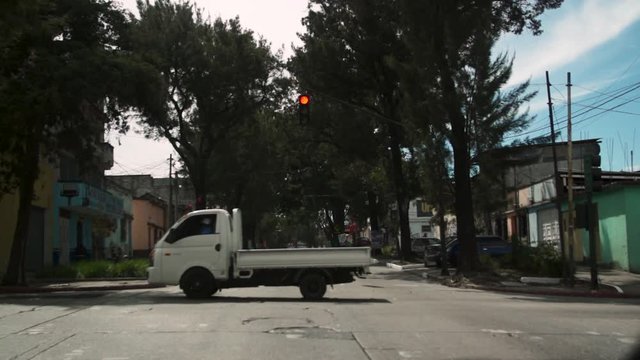 showing the live on the streets of guatemala with cars people and a lot of cool stuff in super slow motion at 200 frames per second