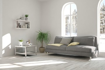 White room with sofa and winter landscape in window. Scandinavian interior design. 3D illustration