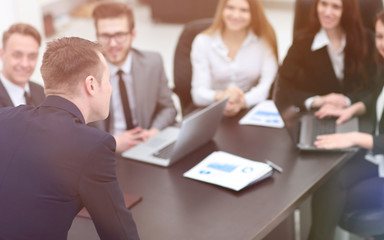 blurred image of business team at a Desk