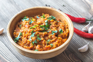 Bowl of red lentil curry - obrazy, fototapety, plakaty