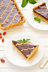 Chocolate tart with peanut butter.