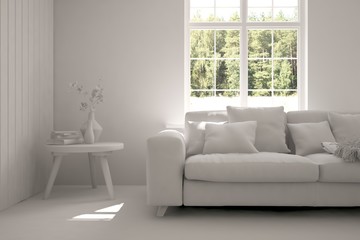 Fototapeta premium Idea of white room with sofa and summer landscape in window. Scandinavian interior design. 3D illustration