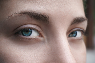 Closeup of young beautiful woman eyes