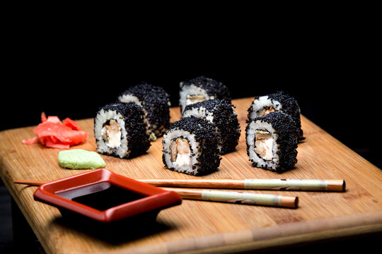 Sushi zuko maki with shrimp, cheese, cucumber and black masago caviar.