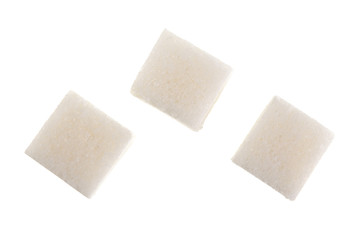 Sugar cubes isolated on white background, close up. Top view. Flat lay