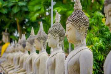 Close up of selective focus Ancient Buddha Statue at WAT YAI CHAI MONGKOL, The Historic City of Ayutthaya, Thailand