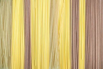 The background of bean cellophane noodles with different toppings.