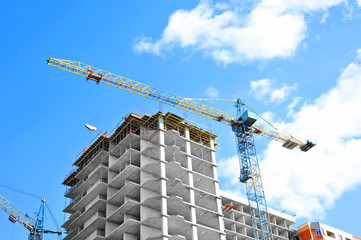 Crane and highrise construction site