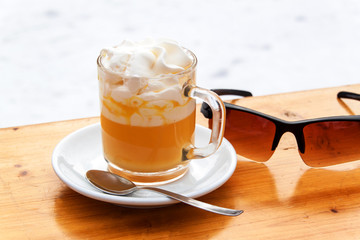 Italian hot drink, Bombardino. Italy, Europe. Hot alcoholic drink on the table.