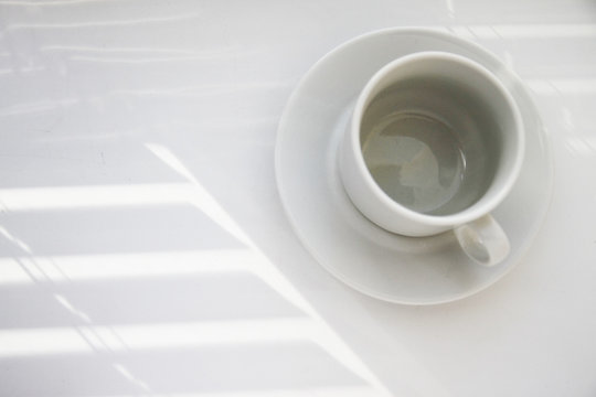 Coffee cup near window