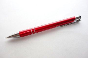 Red ballpen isolated on white background