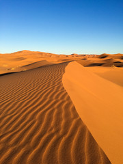 Fototapeta na wymiar Sahara dunes in Merzouga, Africa - The grand Dune of Merzouga