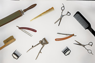 Vintage tools of barber shop on white background