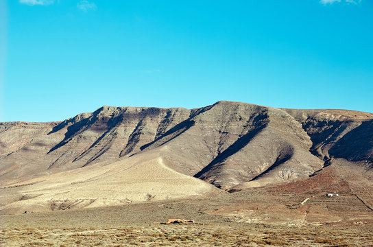 Volcanic hills and blue sky