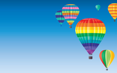 Hot air balloons flying on clearly blue sky background. Available for tour text. Festival, holiday, explore, travel, journey concept.