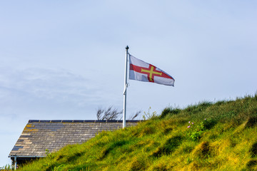 guernsey flag on a house