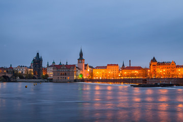 Fototapeta premium View of night old town of Prague and with reflection in Vltava River