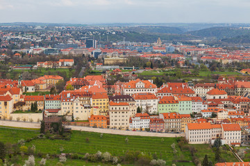 Fototapeta na wymiar Panoramic view of old town with gardens and modern city at the background, Prague, Czech Republic