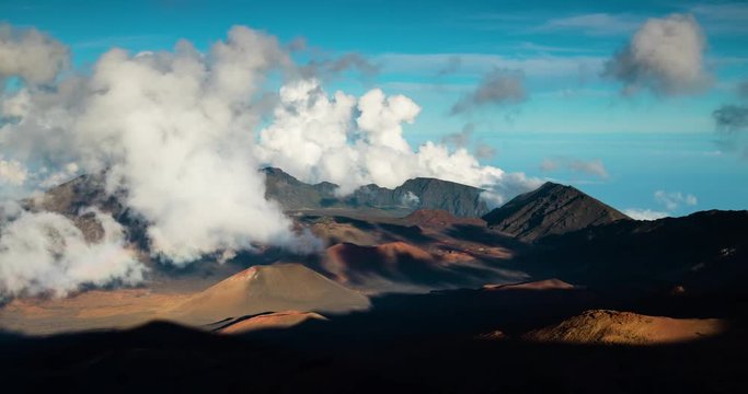 timelapse footage of clouds and shadows moving across the volcanic landscape of haleakala crater on the island of maui in hawaii in the pacific ocean
