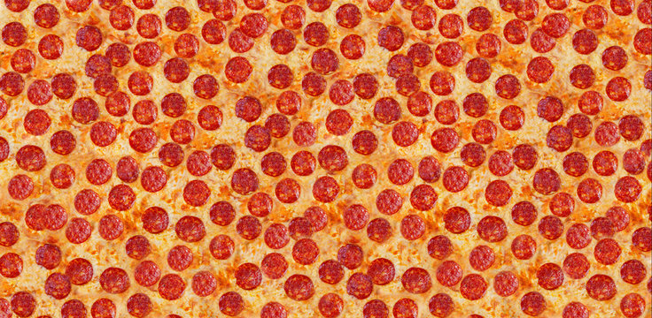 Pepperoni pizza background image. Background of pepperoni pizza for your cafe or restaurant.