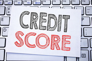 Obraz premium Handwritten text caption showing Credit Score. Business concept writing for Financial Rating Record written on sticky note paper on the white keyboard background.