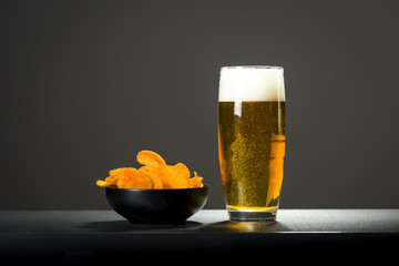 bowl of chips on dark background