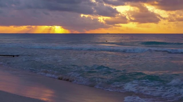 Waves on the beach in the tropics at dawn, Morning at sea, sunrise on the sea beach, orange sunlight, Beach and sea sunset, sea at sunset, at dawn, sunset