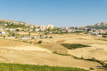 View of Corleone between fields in Sicily, Italy